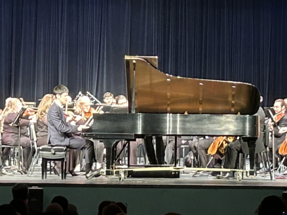Zirui Yin performing with the Fayetteville Symphony Orchestra